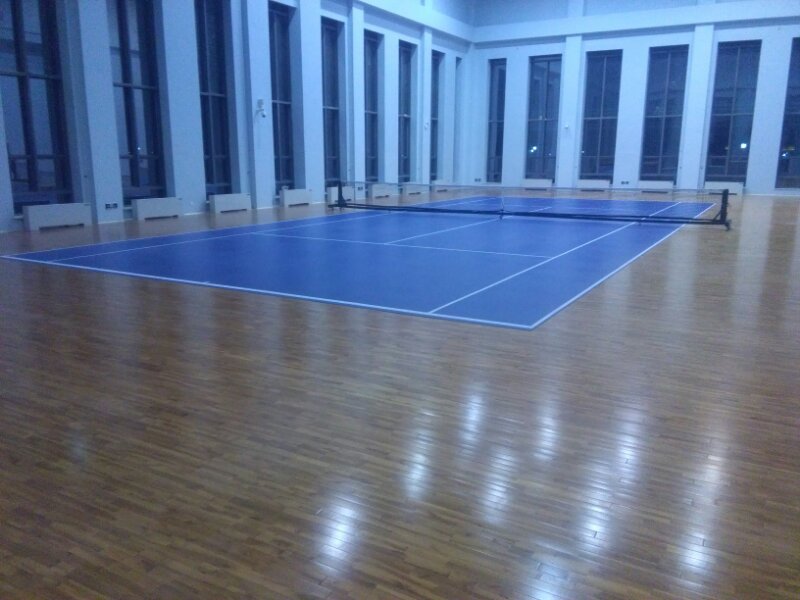 甘肃敦煌大酒店羽毛球场和网球场运动木地板铺设工程5